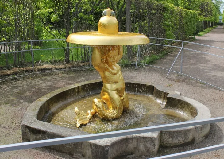 Тритон с колоколом